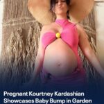 Kourtney Kardashian stopped for a quick maternity selfie during a peaceful summe...